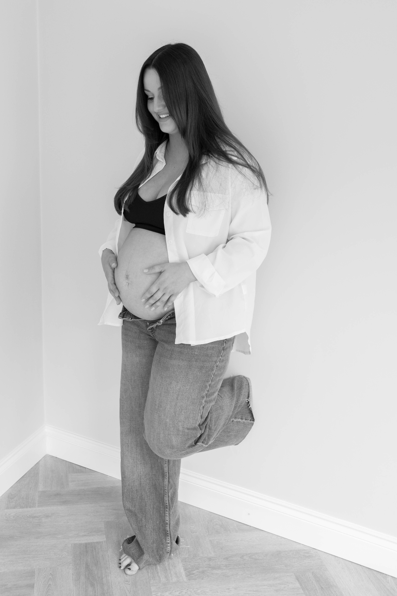Black and white full length maternity portrait